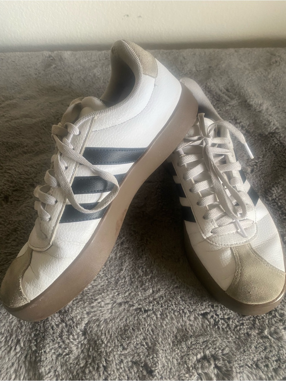 adidas White Sneakers with Black Stripes and Tan Sole Accents